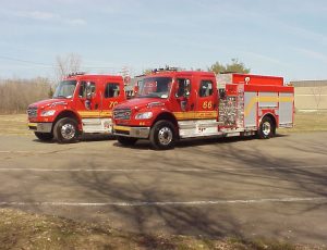Side mount pumpers on a Freightliner Chassis
